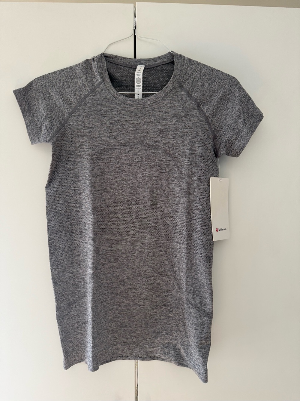 New with tags - Lululemon Heathered Gray Athletic Tee size 6